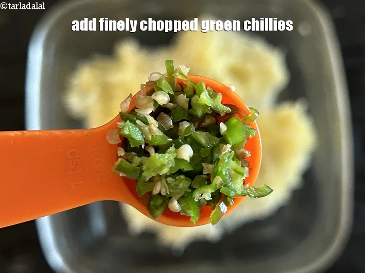 Step 21 – <html><head></head><body><p>Add&nbsp;1 tsp&nbsp;finely&nbsp;<a href="glossary-chopped-green-chilli-820i">chopped green chillies</a>.</p></body></html>