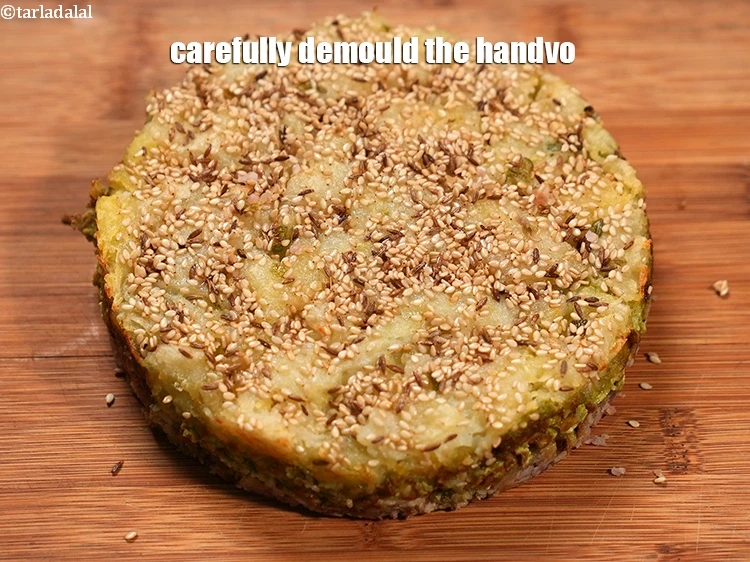 Step 39 – <p>Carefully demould the handvo.</p>