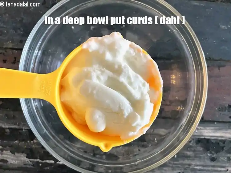 Step 14 – <html><head></head><body><p>In a deep bowl put&nbsp;1 cup&nbsp;<a href="glossary-curd-dahi-yogurt-yoghurt-383i">curds (dahi)</a>.</p></body></html>