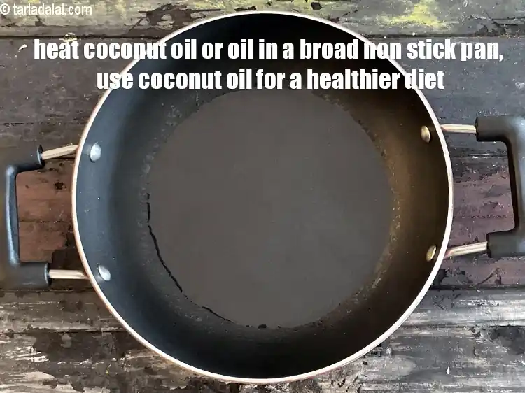 Step 21 – <p>To make the <strong>gavarfali ki sabzi</strong>, heat 2 tbsp coconut oil or&nbsp;oil in a broad …