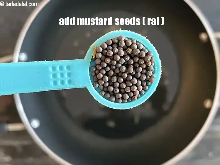 Step 23 – <html><head></head><body><p>Add&nbsp;1/2 tsp&nbsp;<a href="glossary-mustard-seeds-sarson-rai-sarson-ke-beej-525i">mustard seeds ( rai / sarson)</a>.</p></body></html>