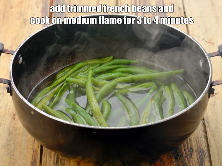 Step 3 – <p><span style="background-color:rgb(255,255,255);color:rgb(0,0,0);">Add the </span>trimmed <a href="https://www.tarladalal.com/glossary-French-beans-fansi-196i"><u>french beans</u></a><span style="background-color:rgb(255,255,255);color:rgb(0,0,0);"> and cook on medium flame for 3 …