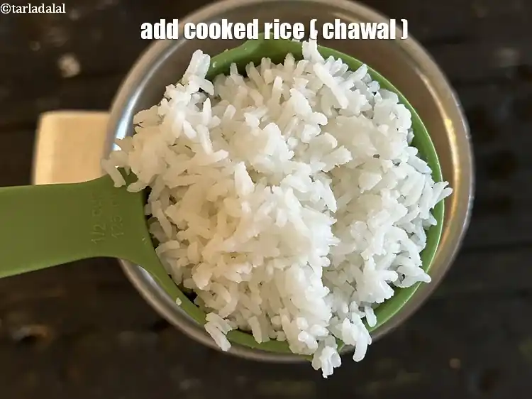 Step 13 – <p>Add&nbsp;1/2 cup&nbsp;<a href="https://www.tarladalal.com/cooked-rice-32639r">cooked rice (chawal)</a>.</p>