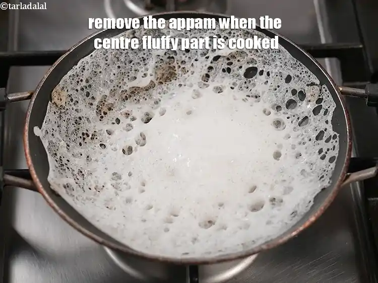 Step 37 – <p>Remove the appam when the centre fluffy part is cooked.</p>