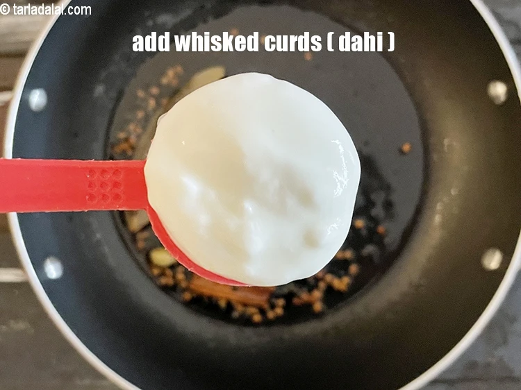 Step 12 – <html><head></head><body><p>Add&nbsp;1 tbsp&nbsp;<a href="glossary-whisked-curds--2096i">whisked curds (dahi)</a>.</p></body></html>