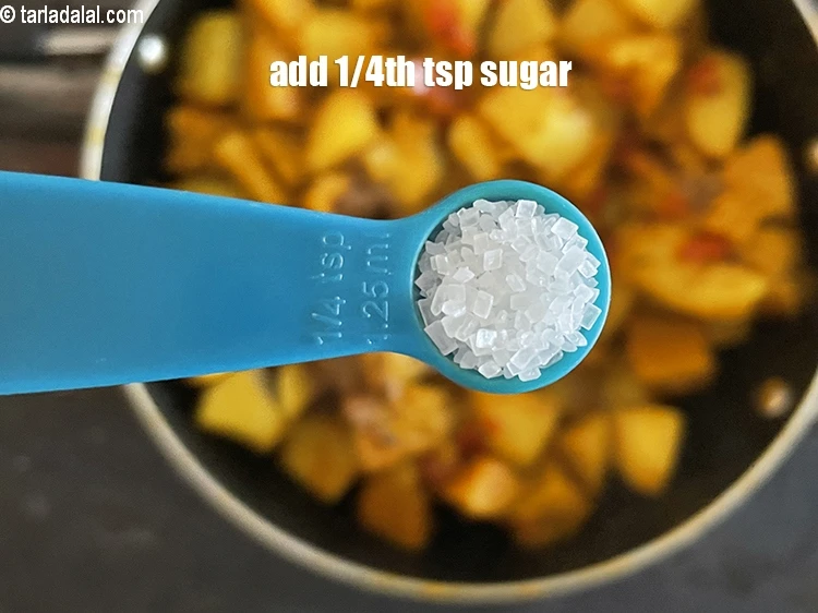 Step 28 – <html><head></head><body><p>Add&nbsp;1/4 tsp&nbsp;<a href="glossary-sugar-chini-shakkar-278i">sugar</a>.</p></body></html>