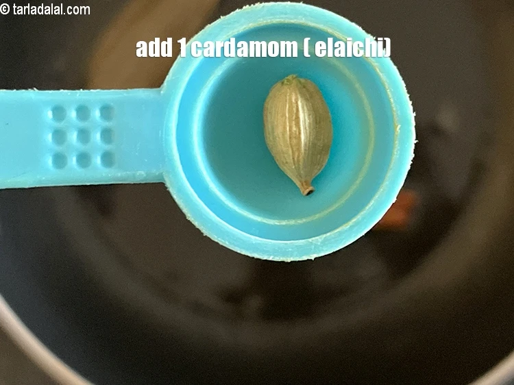Step 7 – <html><head></head><body><p>Add&nbsp;1&nbsp;<a href="glossary-cardamom-elaichi-262i">cardamom (elaichi)</a>.</p></body></html>