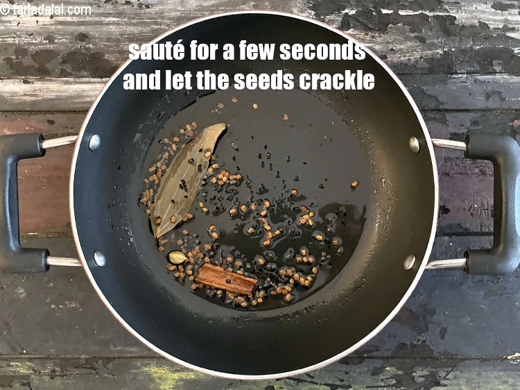 Step 11 – <p>Sauté on a medium flame for a few seconds.&nbsp;Let the seeds crackle.</p>