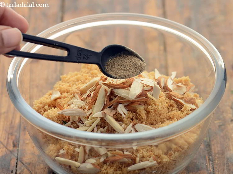 Step 25 – <p>Add cardamom powder to enhance the flavour of churma.</p>