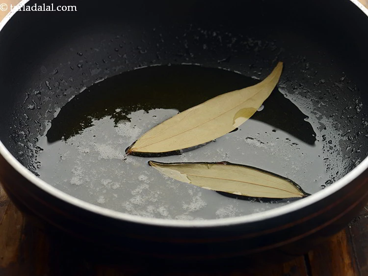 Step 35 – <p>Add bay leaves.</p>