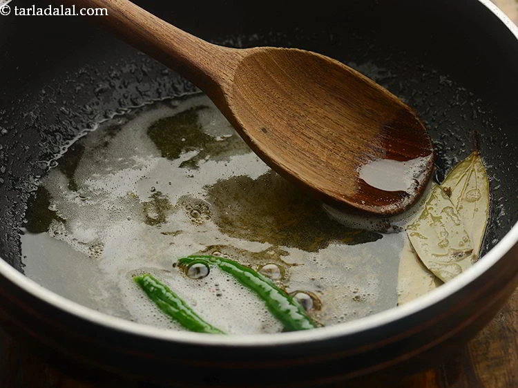 Step 38 – <p>Add asafoetida and sauté on a medium flame for a few seconds.</p>
