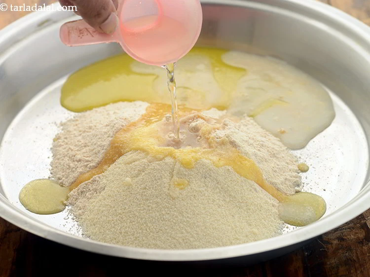 Step 11 – <p>Pour ¼ cup of water. You can also make use of milk instead of water. …