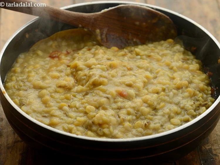 Step 48 – <p>Add the cooked dals (along with the water).</p>