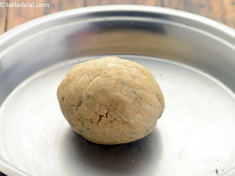 Step 59 – <p>Add salt to taste. Knead into a semi-stiff dough, without using any water.</p>