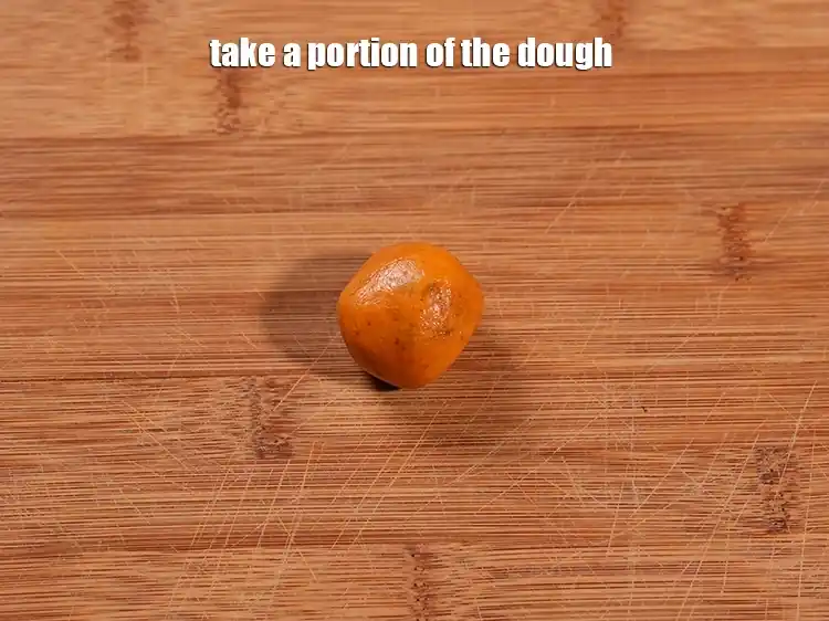 Step 13 – <p>Take a portion of the dough.</p>