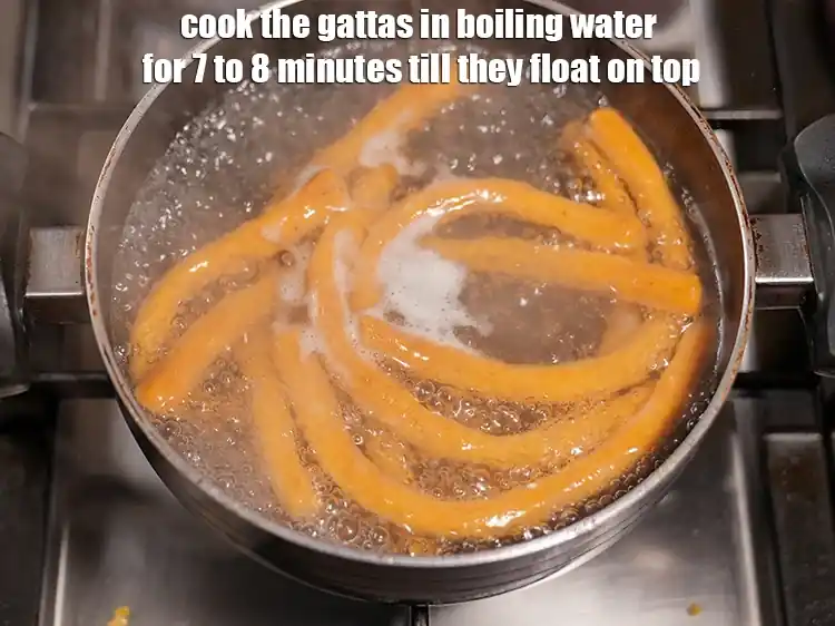 Step 18 – <p><span style="background-color:rgb(255,255,255);color:rgb(0,0,0);">Cook the gattas in boiling water for 7 to 8 minutes till they float …