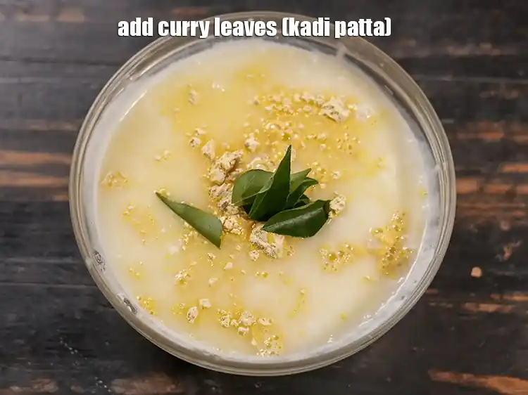 Step 24 – <p>Add 4 to 6 <a href="https://www.tarladalal.com/glossary-curry-leaves-kadi-patta-kadipatta-388i"><u>curry leaves (kadi patta)</u></a><u>.</u></p>