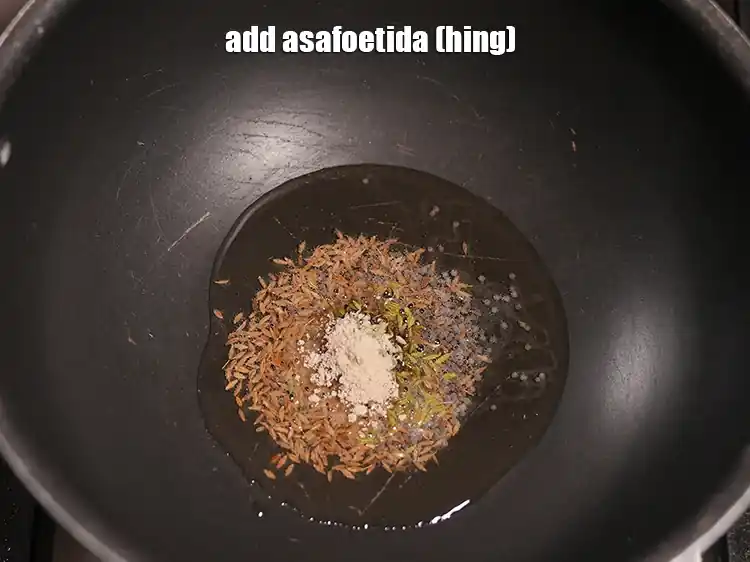 Step 30 – <html><head></head><body><p>Add&nbsp;1/4 tsp&nbsp;<a href="glossary-asafoetida-hing-113i">asafoetida (hing)</a>.</p></body></html>