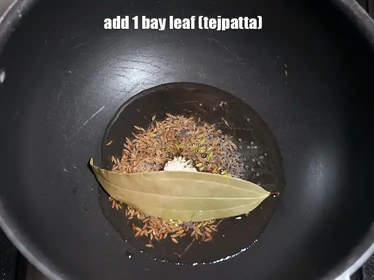 Step 31 – <html><head></head><body><p>Add&nbsp;1&nbsp;<a href="glossary-bay-leaf-tejpatta-bay-leaves-189i">bayleaf (tejpatta)</a>.</p></body></html>