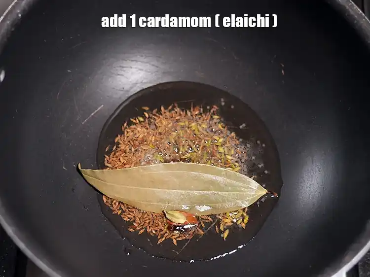 Step 34 – <html><head></head><body><p>Add&nbsp;1 <a href="https://www.tarladalal.com/glossary-cardamom-elaichi-262i"><u>cardamom (elaichi)</u></a><u>.</u></p></body></html>