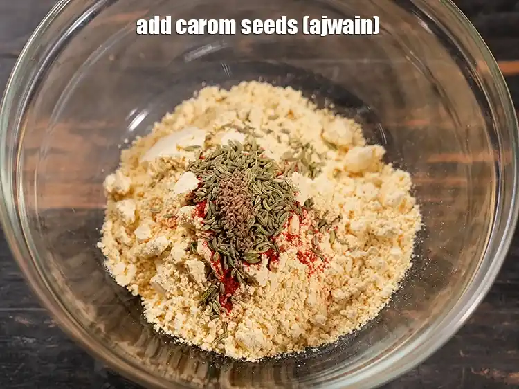 Step 6 – <html><head></head><body><p>Add&nbsp;1/8 tsp&nbsp;<a href="glossary-carom-seeds-ajwain-thymol-seeds-bishops-weed-266i">carom seeds (ajwain)</a>.</p></body></html>