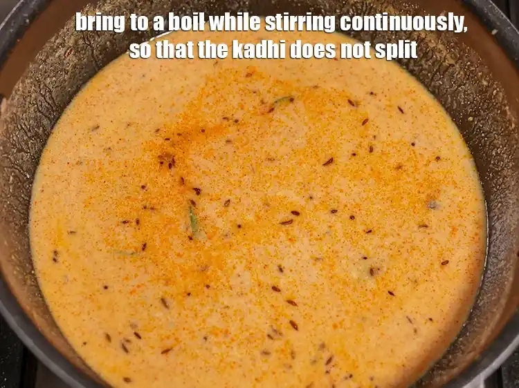 Step 42 – <p>Bring to a boil while stirring continuously, so that the kadhi does not split.</p>