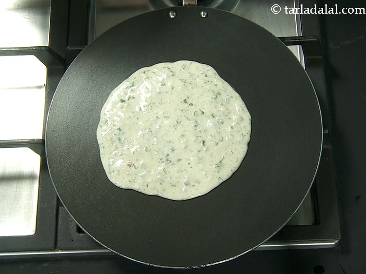 Step 19 – <p>Spread it in a circular motion to make a 125 mm. (5") dosa.</p>