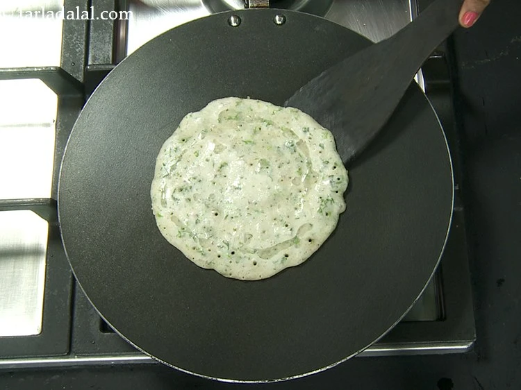 Step 21 – <p>Cook the oats dosa till it turns golden brown in colour from bottom side and …