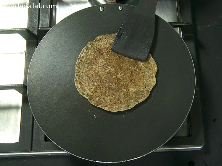 Step 22 – <p>Cook on the other side too and remove the oats dosa in a plate.</p>