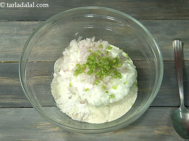 Step 11 – <p>Add finely chopped green chillies. If making oats dosas for kids, do not add green …