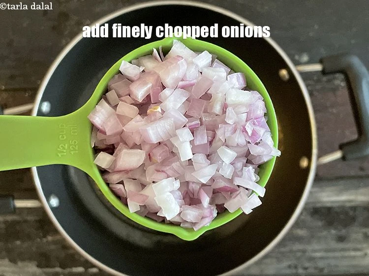 Step 13 – <html><head></head><body><p>Add&nbsp;1/2 cup&nbsp;finely&nbsp;<a href="glossary-chopped-onions-722i">chopped onions</a>.</p></body></html>