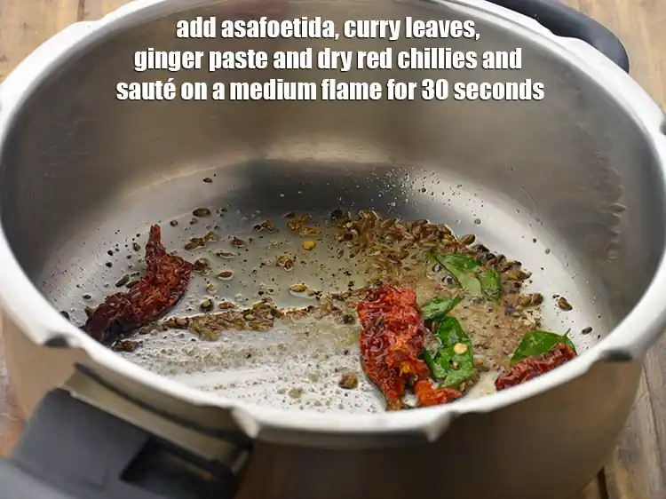 Step 9 – <p><span style="background-color:rgb(255,255,255);color:rgb(0,0,0);">Add the </span>1/4 tsp <a href="https://www.tarladalal.com/glossary-asafoetida-hing-113i"><u>asafoetida (hing)</u></a><span style="background-color:rgb(255,255,255);color:rgb(0,0,0);">, </span>4 <a href="https://www.tarladalal.com/glossary-curry-leaves-kadi-patta-kadipatta-388i"><u>curry leaves (kadi patta)</u></a><span …