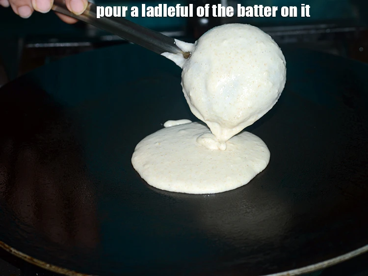 Step 23 – <p>Pour a ladleful of the batter on it.</p>