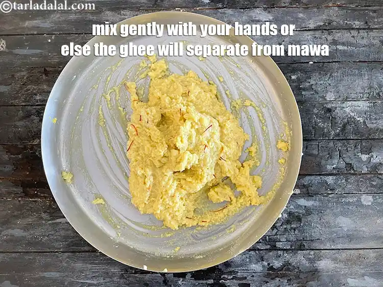 Step 14 – <html><head><meta charset="UTF-8"> </head><body><p>Mix gently with your hands and our mixture for&nbsp;<strong>Kesar Peda</strong>&nbsp;is ready. Mixing gently …