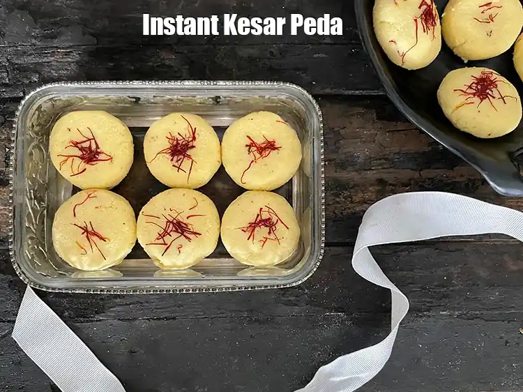 Step 24 – <html><head><meta charset="UTF-8"> </head><body><p>Serve or store the&nbsp;<strong>kesar mawa peda</strong>&nbsp;in an air-tight container and refrigerate.</p></body></html>