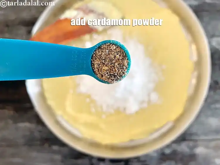 Step 12 – <html><head><meta charset="UTF-8"> </head><body><p>Add&nbsp;1/4 tsp&nbsp;<a href="glossary-cardamom-powder-elaichi-powder-265i">cardamom (elaichi) powder</a>.</p></body></html>