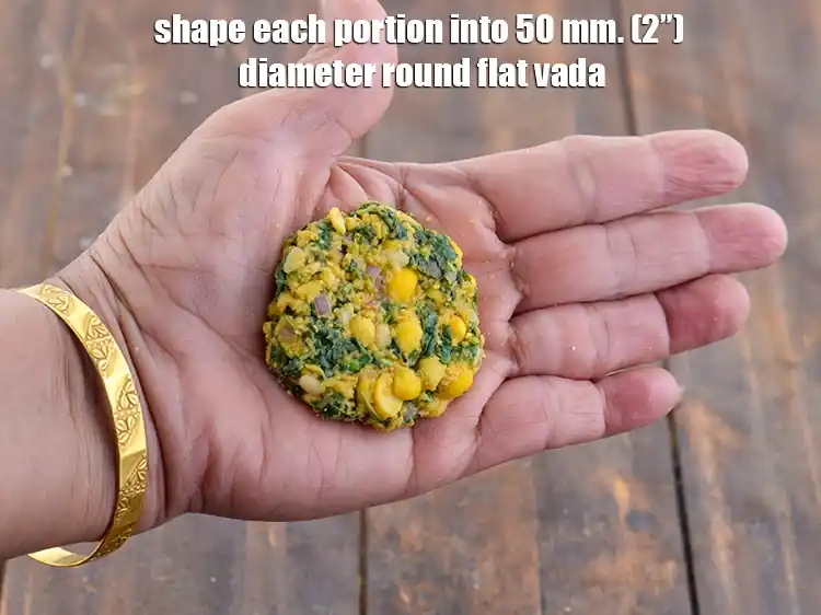 Step 7 – <p><span style="background-color:rgb(255,255,255);color:rgb(0,0,0);">Shape each portion into 50 mm. (2”) diameter round flat <strong>vada</strong>.</span></p>