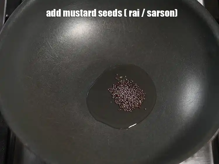 Step 2 – <p>Add 1/2 tsp <a href="https://www.tarladalal.com/glossary-mustard-seeds-sarson-rai-sarson-ke-beej-525i"><u>mustard seeds ( rai / sarson)</u></a>.</p>