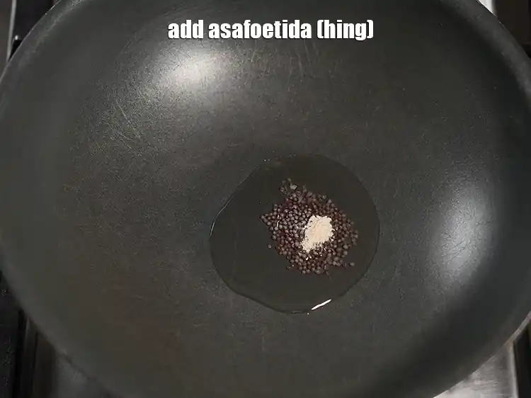 Step 3 – <p>Add 1/4 tsp <a href="https://www.tarladalal.com/glossary-asafoetida-hing-113i"><u>asafoetida (hing)</u></a><u>.</u></p>