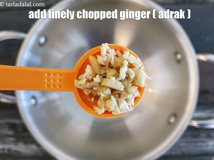 Step 3 – <p>Add 1 tsp&nbsp;finely&nbsp;<a href="glossary-chopped-ginger-786i">chopped ginger (adrak)</a>.</p>