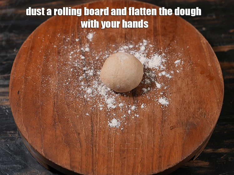 Step 12 – <p>Dust a rolling board and flatten the dough with your hands.</p>