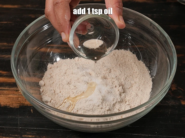 Step 3 – <p>Add 1 tsp <a href="https://www.tarladalal.com/glossary-oil-671i"><u>oil</u></a><u>.</u></p>