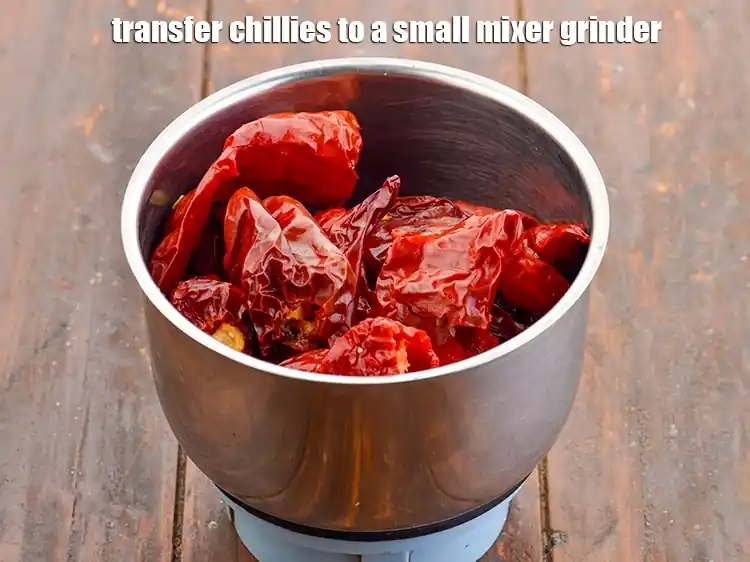 Step 4 – <p>Transfer the <strong>chillies</strong> to a small mixer grinder. If you are making this&nbsp;<strong>Homemade Chilli Garlic …