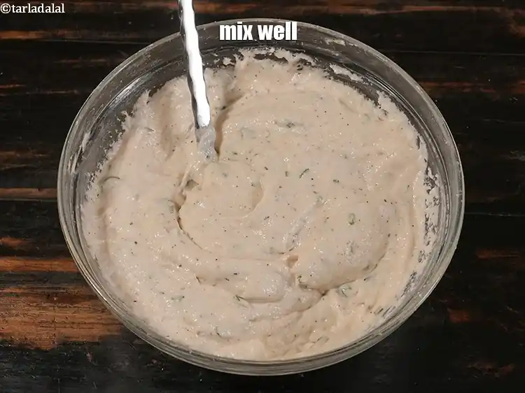 Step 13 – <p><span style="background-color:rgb(255,255,255);color:rgb(0,0,0);">Mix well and our&nbsp;</span><strong>ulundu bonda </strong><span style="background-color:rgb(255,255,255);color:rgb(0,0,0);">batter is ready.</span></p>