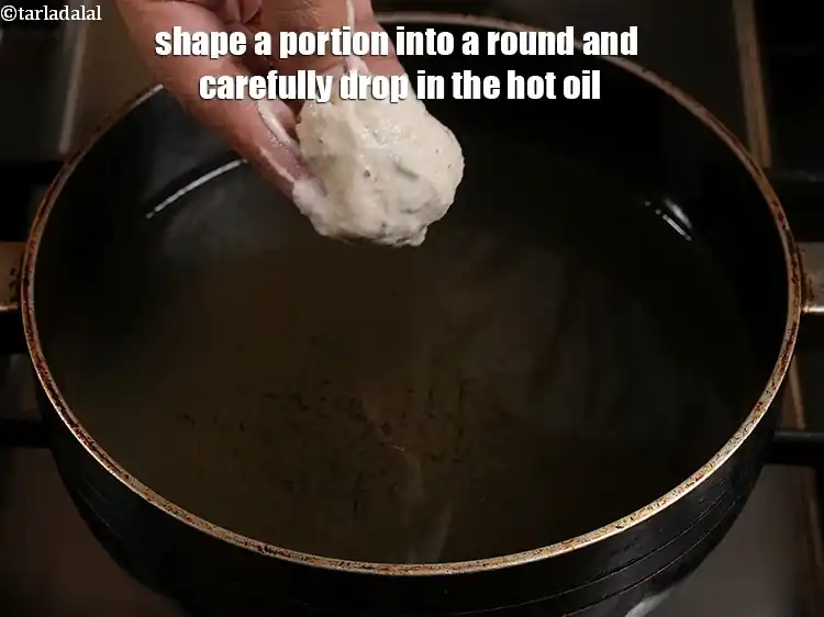 Step 15 – <p><span style="background-color:rgb(255,255,255);color:rgb(0,0,0);">Shape a portion into a round and carefully drop in the hot oil. You …