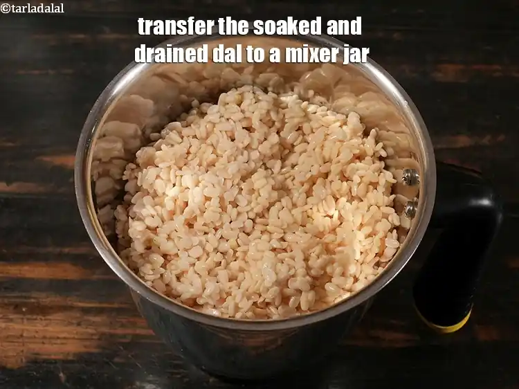 Step 4 – <p style="margin-left:0px;"><span style="background-color:rgb(255,255,255);color:rgb(0,0,0);">Transfer the soaked and drained dal to a mixer jar. If you have …