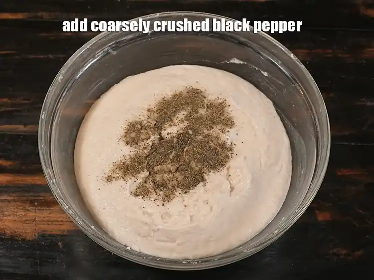 Step 8 – <p><span style="background-color:rgb(255,255,255);color:rgb(0,0,0);">Add all the remaining ingredients starting with </span>1/2 tsp coarsely <a href="https://www.tarladalal.com/glossary-crushed-black-pepper-568i"><u>crushed black pepper …