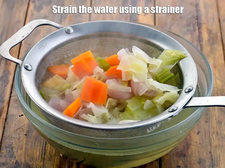 Step 10 – <p>Strain the water using a strainer or colander and discard the vegetables of the&nbsp;<strong>Clear Vegetable …