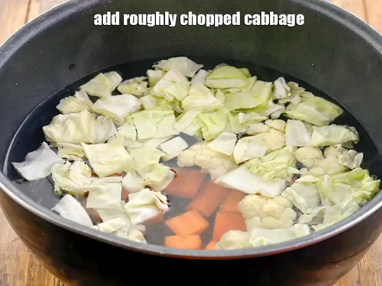 Step 6 – <p>Add the 1/2 cup roughly <a href="https://www.tarladalal.com/glossary-cabbage-patta-gobi-kobi-248i#ing_2363"><u>chopped cabbage</u></a>.</p>