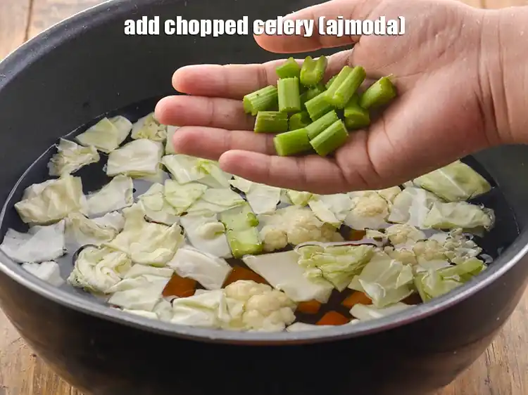 Step 7 – <p>Add the 1/4 cup <a href="https://www.tarladalal.com/glossary-celery-ajmoda-257i#ing_2377"><u>chopped celery (ajmoda)</u></a>. This is like a crucial flavoring agent …
